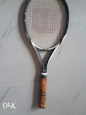 Black And Brown Wilson Tennis Racket