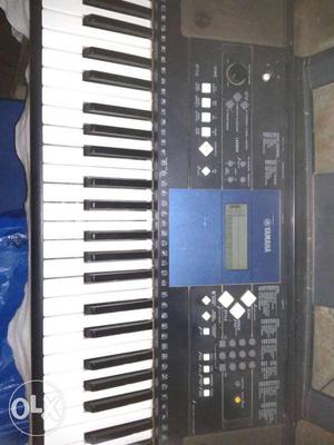 Black And White Yamaha Electric Keyboard