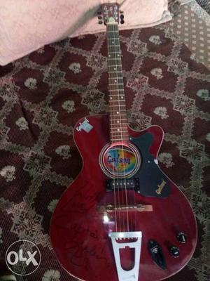 Cutaway Red Gibson Acoustic Guitar