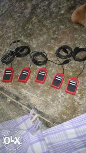Five Red Electronic Devices