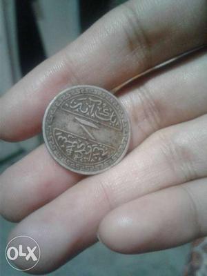 It's a nizam period coin in the year  (ek