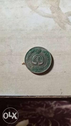 Its a old IX ASIAN GAMES DELHI  coin.I can