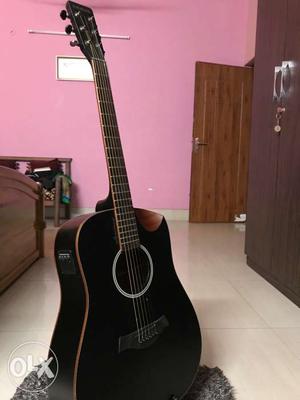 Kadence semi acoustic guitar,few months old,