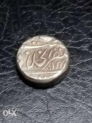 One Round Vintage Coin