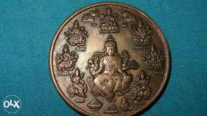 Round Gold-colored Buddha Engraved Coin