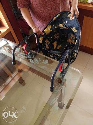 Baby seat with table holder