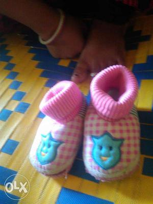 Baby's Pink And Blue Shoes