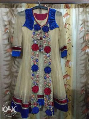Beautiful Beige and blue color suit. Suitable for