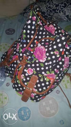 Black, White, And Pink Floral Polka-dot Backpack