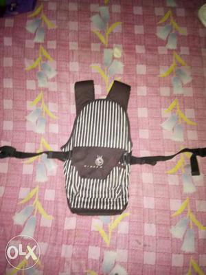 Brown And White Striped Backpack