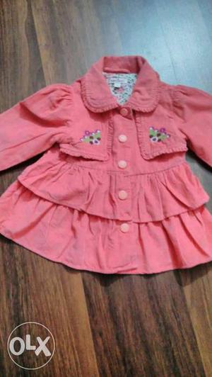 Girls beautiful coral colour winter jacket from