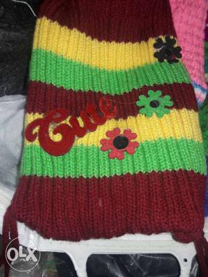 Red, Green, And Yellow Floral Knit Textile