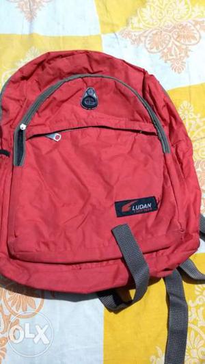 Red parachute bag for picnic or college use