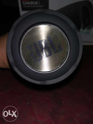Round Gray JBL Portable Speaker