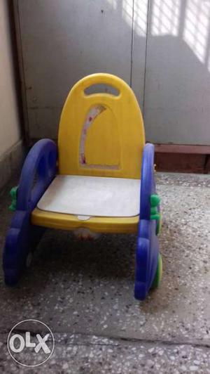 Toddler's Yellow, Blue, And White Plastic Armchair