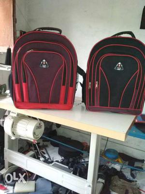 Two Black And Maroon Backpack