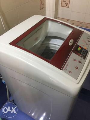 White And Red Top Load Washer