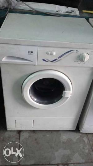 White IFB Front-load Washing machine for sell.