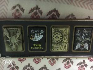 Zippo Lighters set of 4 New with cover. Set of 4