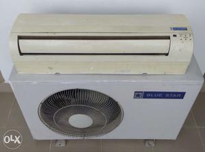 Beige Split-type Air Conditioner And White Air Condensing