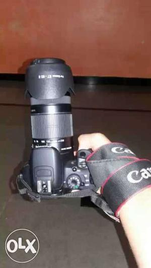 Black And Gray Canon DSLR Camera