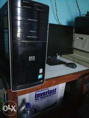 Black HP Computer Tower And Compaq Flat Screen Monitor