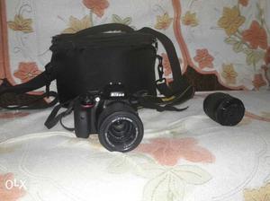 Black Nikon DSLR Camera With Bag Case
