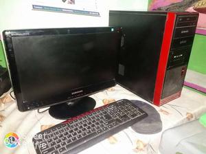 Black Samsung Lcd Monitor With Computer Tower And Keyboard
