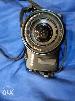 Canon EOS M with  kit lens and 22mm pancake