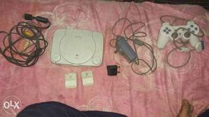 Gray Sony PS1 With Controller And AC Adapters