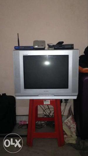 Grey TV in excellent condition with set top box