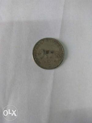 It's old currency coin by King V George 