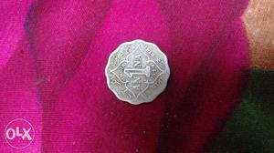 Round silver coin ANNA India.