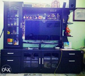 Show Case with TV Stand 7' wide, 6'6" height and 22" depth.