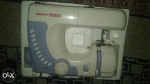 White And Blue Electric Sewing Machine