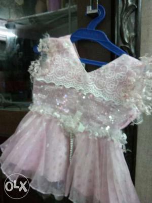 A baby pink color frock