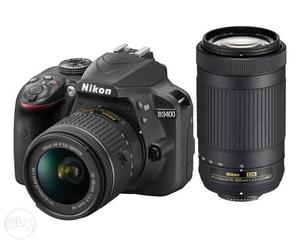Black Nikon D With Dual Lens