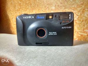 Black Yashica Point-and-shoot Camera