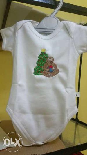 Embroidered body suit for new borns. Please inbox
