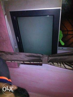 Gray And Black Flat Screen TV