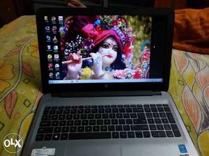 HP black & gray laptop...15.7" display..call fast. Low cost