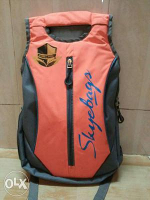 Orange And Gray Skyebags Backpack
