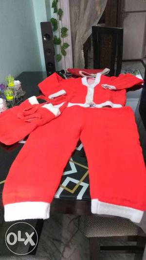 Santa dress almost new with bag and cap with