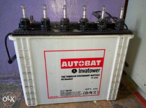 White, Red, And Black Autobat Vehicle Battery