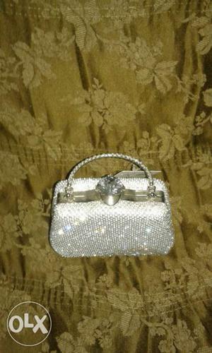 NEW clutch for sale. many more purses available