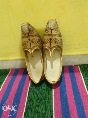 Pair of brown leather flats