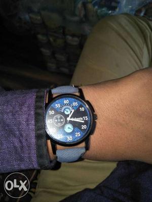 Round Black Chronograph Watch With Blue Leather Strap