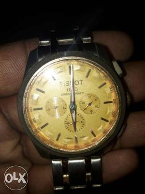 Round Gold Tissot Chronograph Watch