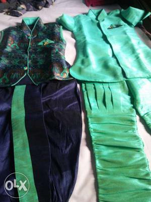 Two Green And Purple Traditional Dresses