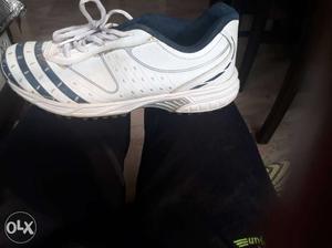 White Cricket Shoes. Brand-Vijayanti